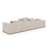 Kremowa sofa modułowa z szezlongiem | Caracole Bello